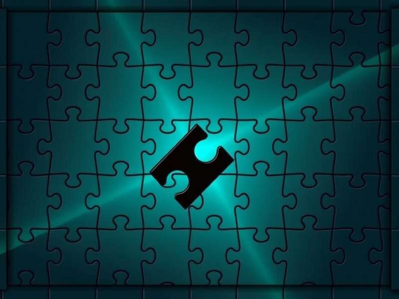 Antique wooden jigsaw puzzle map on a table